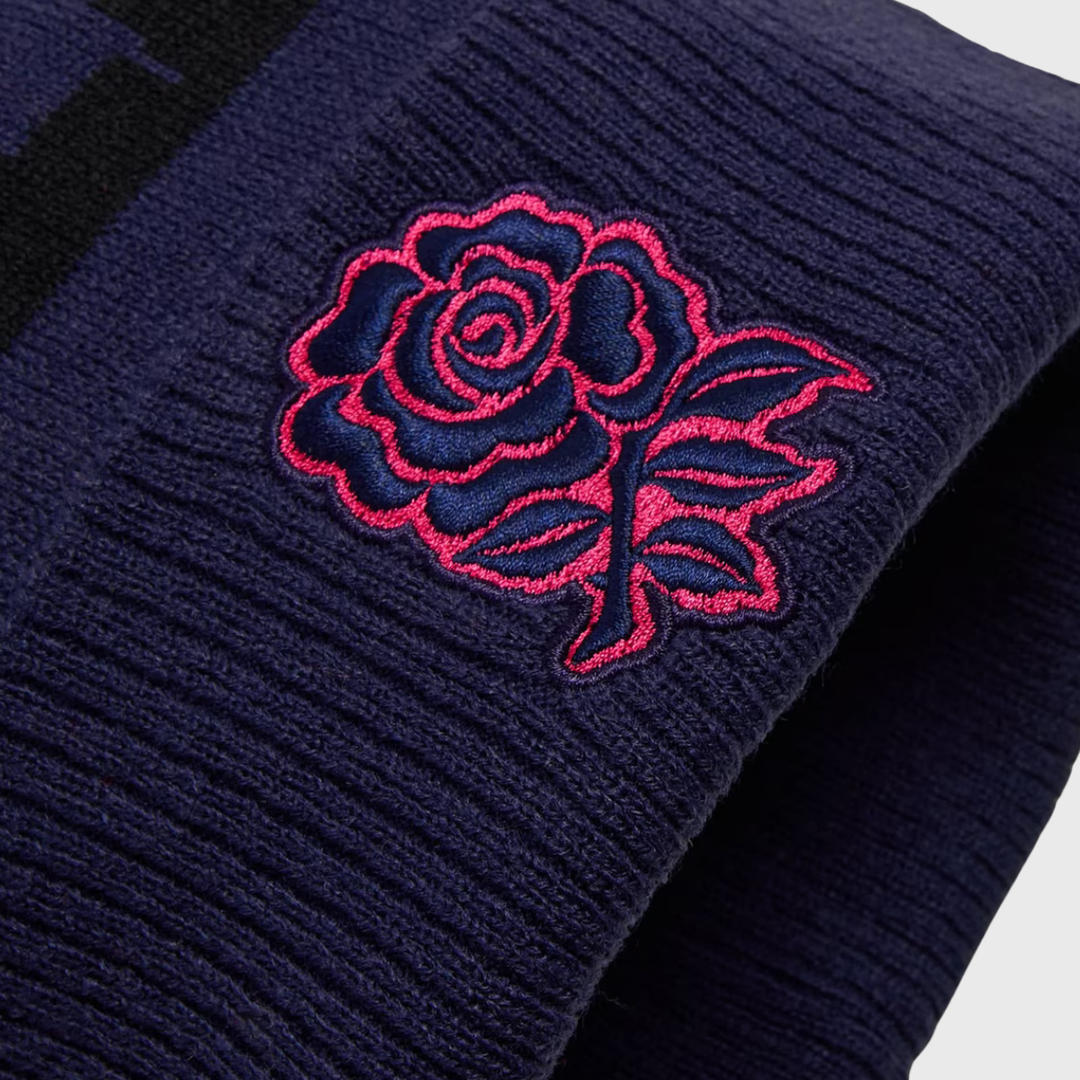 Castore England Rugby Bobble Beanie Hat Rhodonite Blue/Diva Pink 2026/27