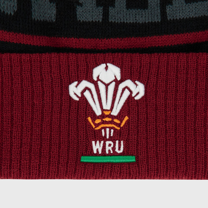 Macron Wales Cymru Rugby Text Bobble Beanie Hat Black/Red - Rugbystuff.com